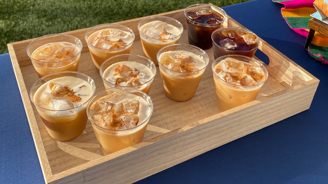 Cups of coffee, including iced lattes and cold brew.